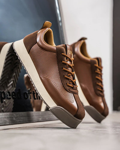 Zayne Paneled Leather Sneaker