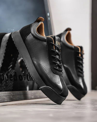 Zayne Paneled Leather Sneaker